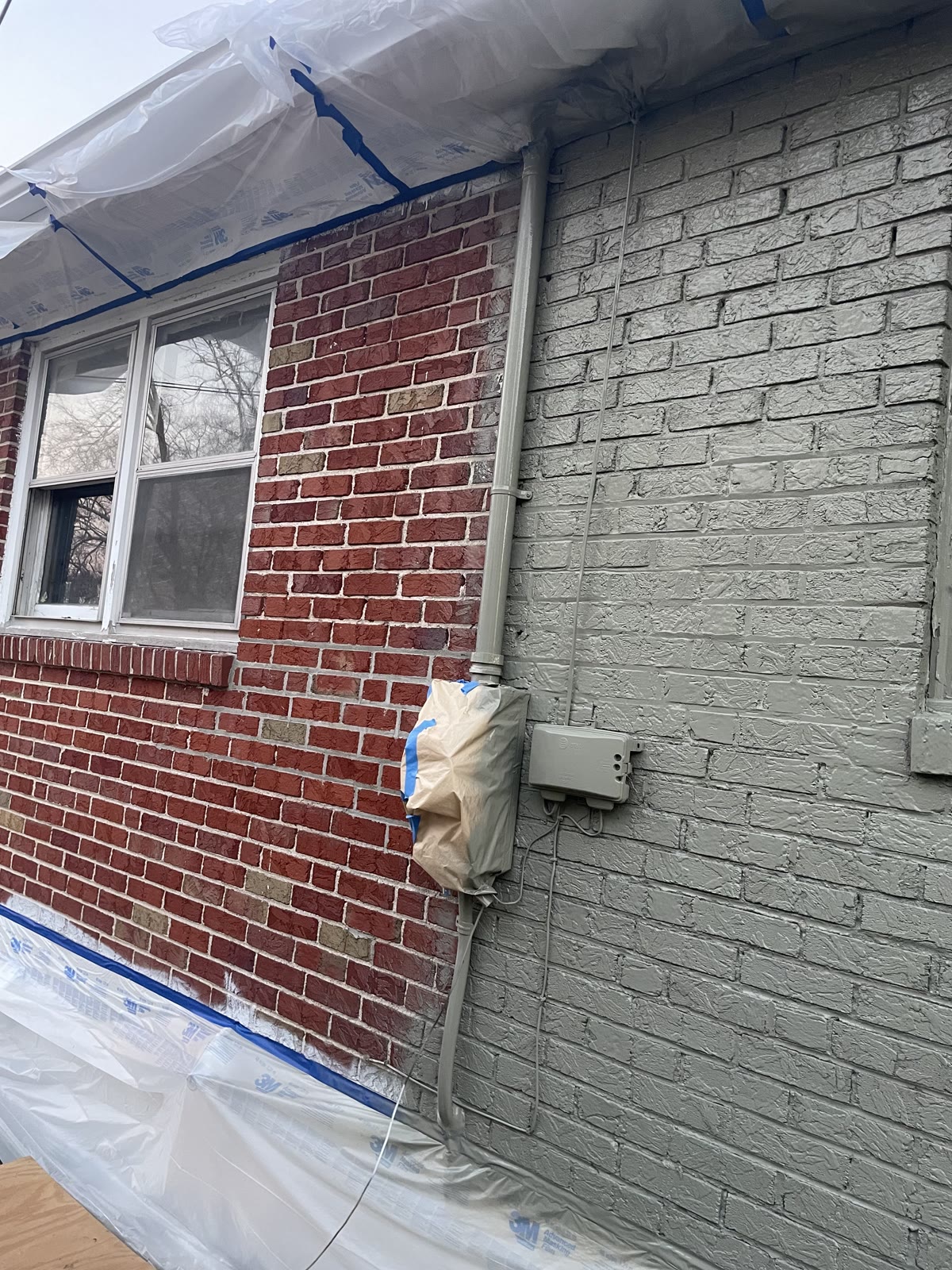 Exterior brick painting by LJC Construction in Jefferson County