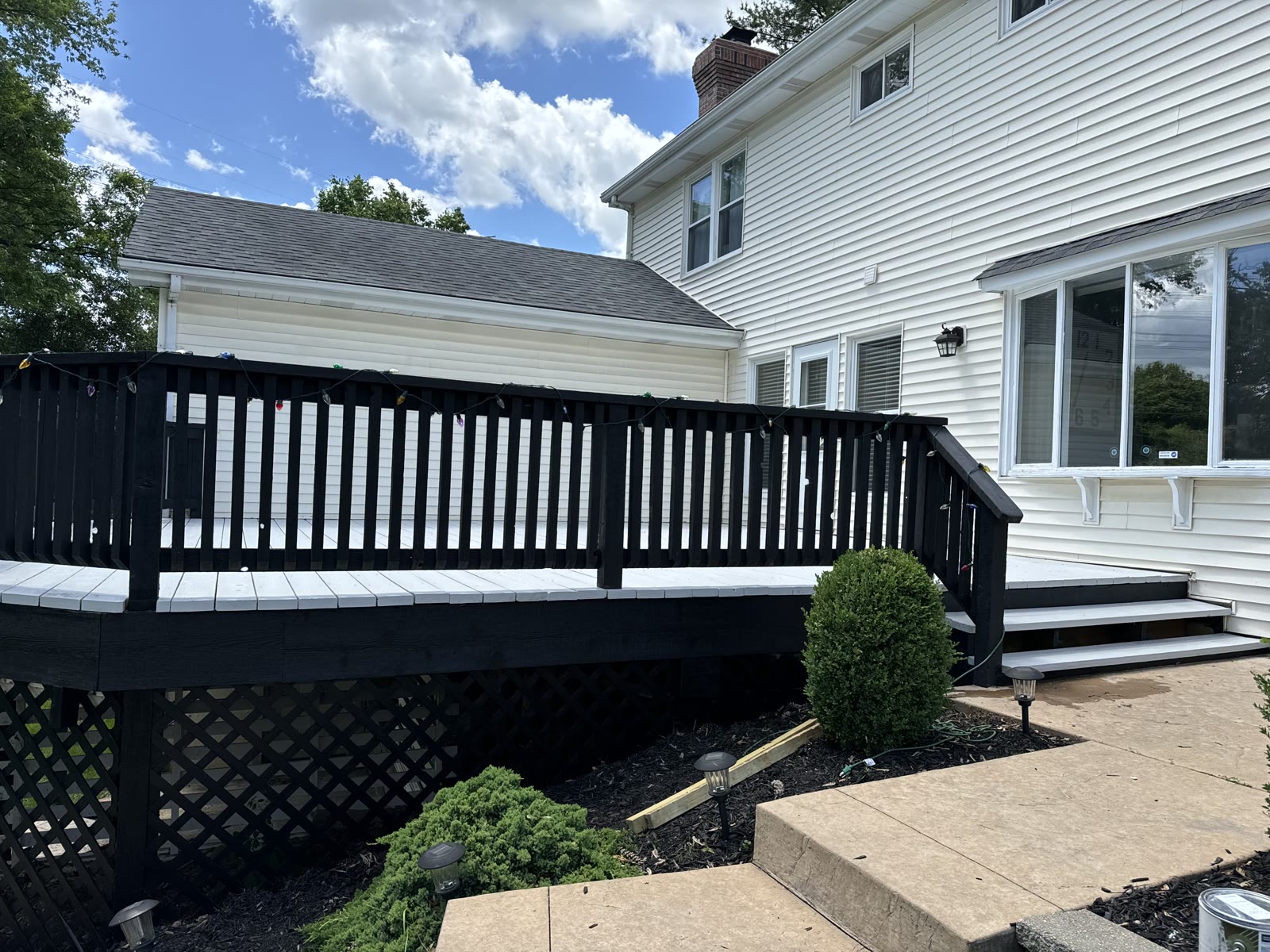 Refinished black deck on a Jefferson County home
