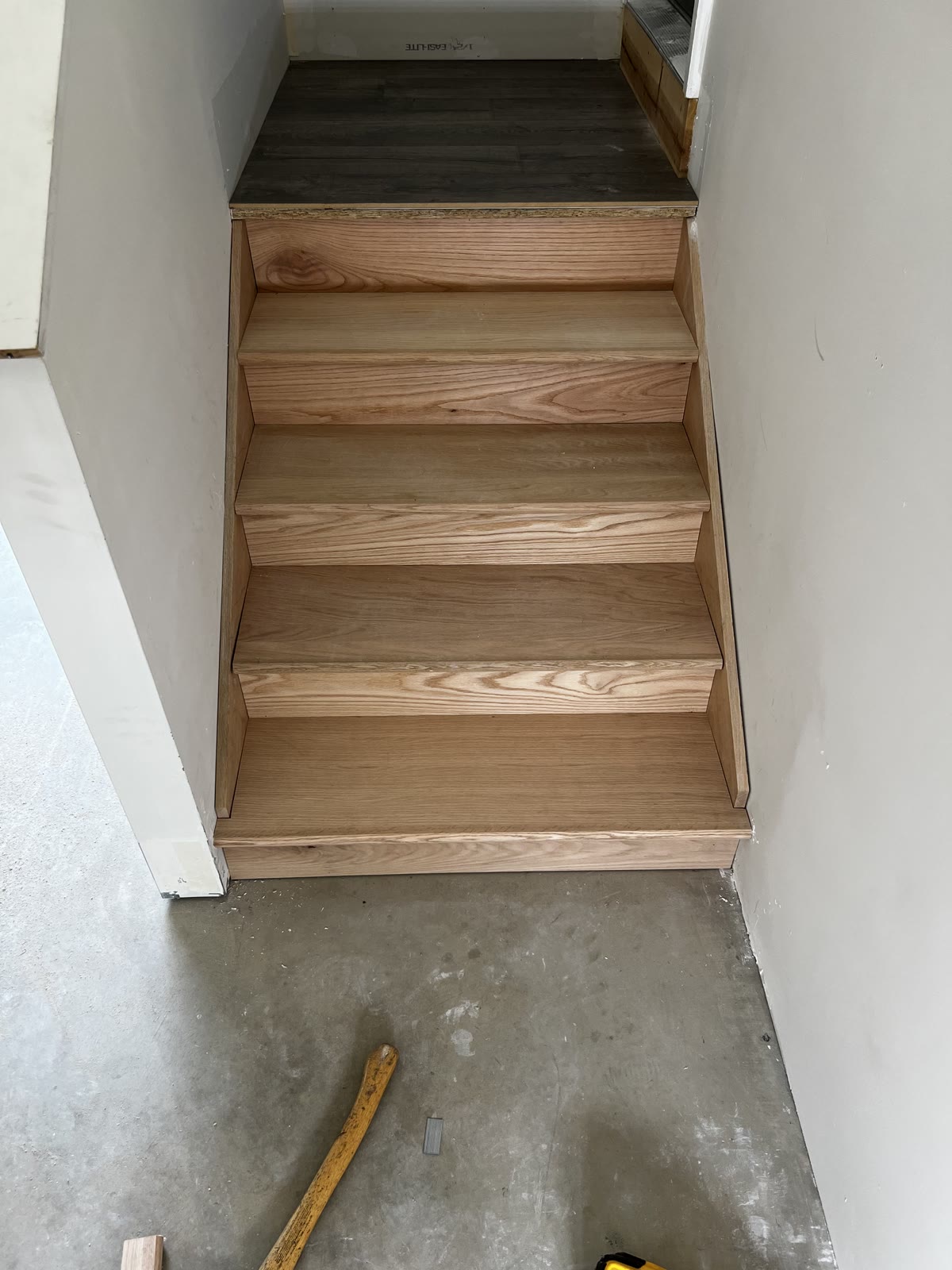 Newly installed oak stair treads and risers